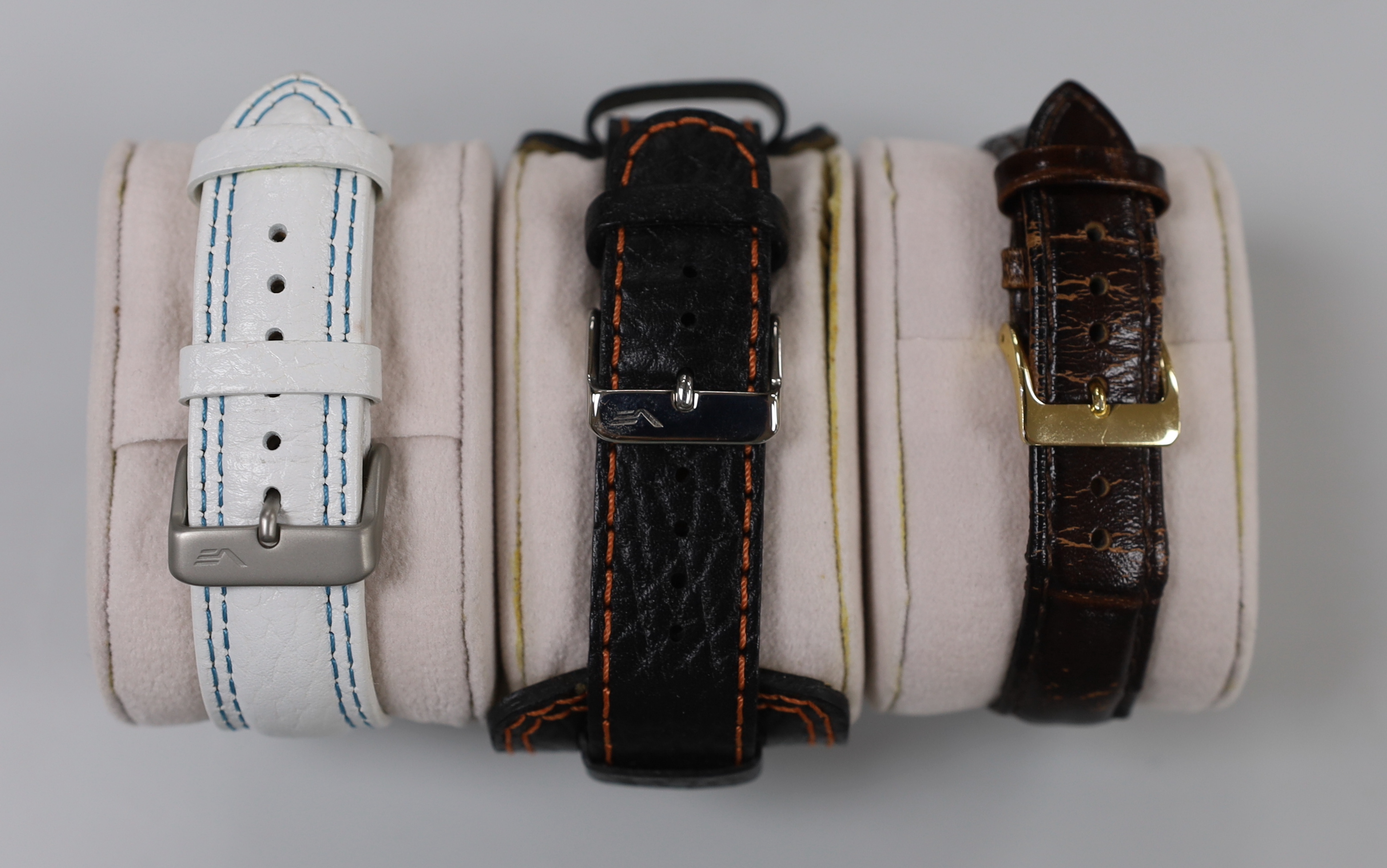 Three gentleman's modern stainless steel wrist watches including Vostok Europe and two other Russian watches.